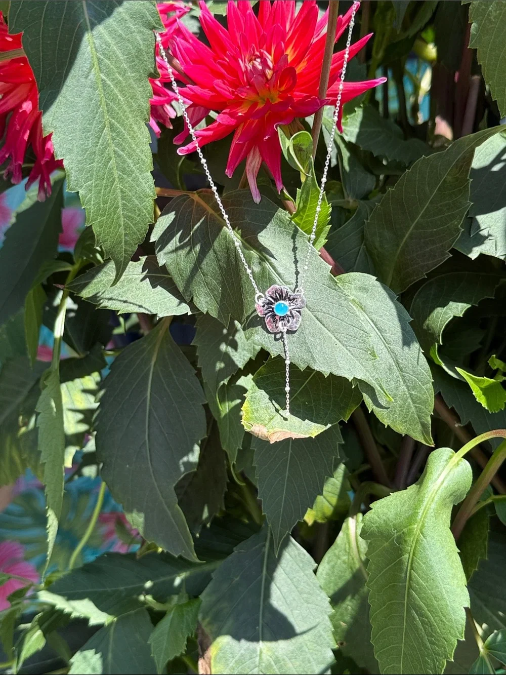 Fine silver .999 Hibiscus flower pendant necklace with a blue Calcedony center!